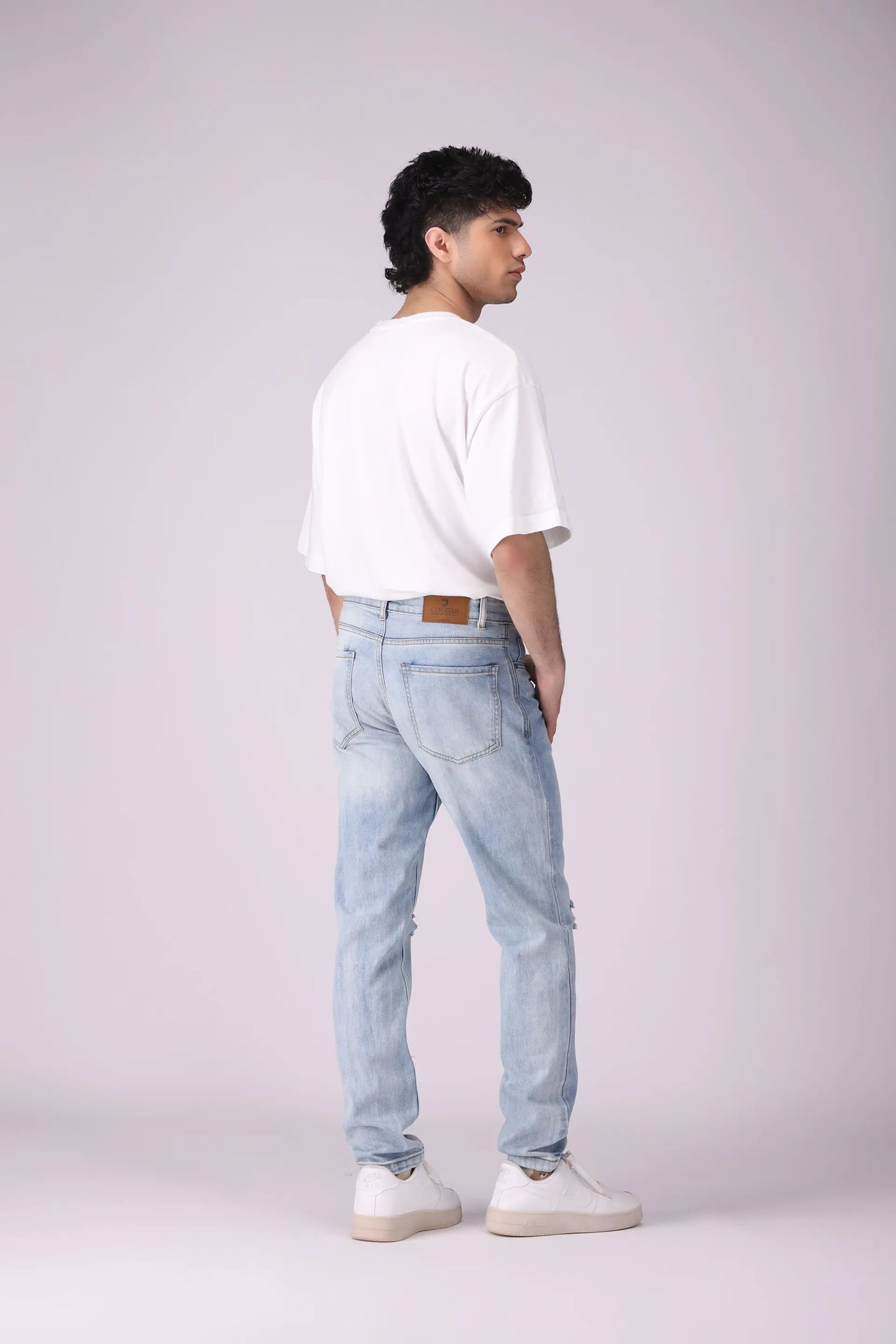 Tapered Fit Ripped Jeans - Cougar Clothing