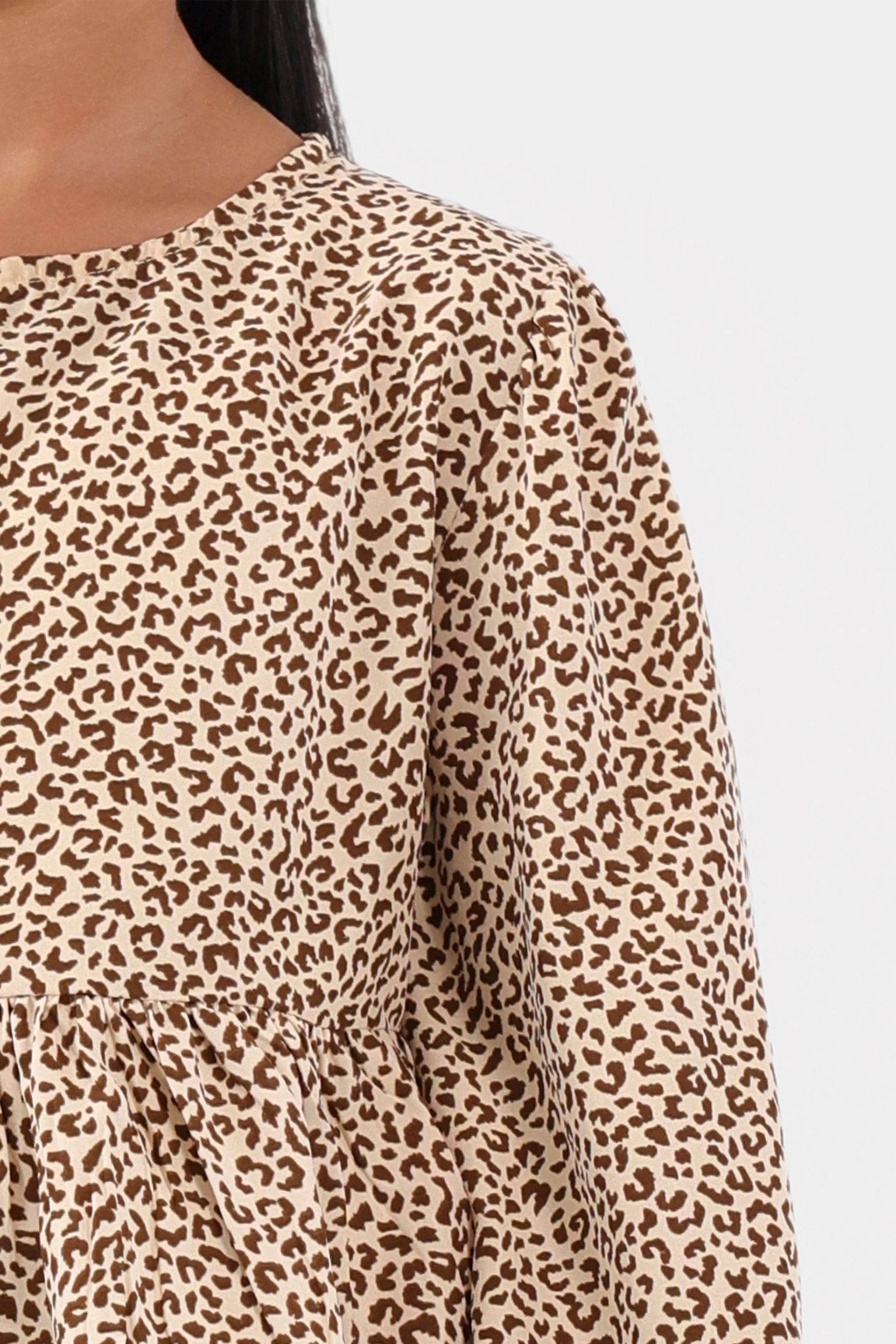 Cheetah Print Peplum - Cougar Clothing