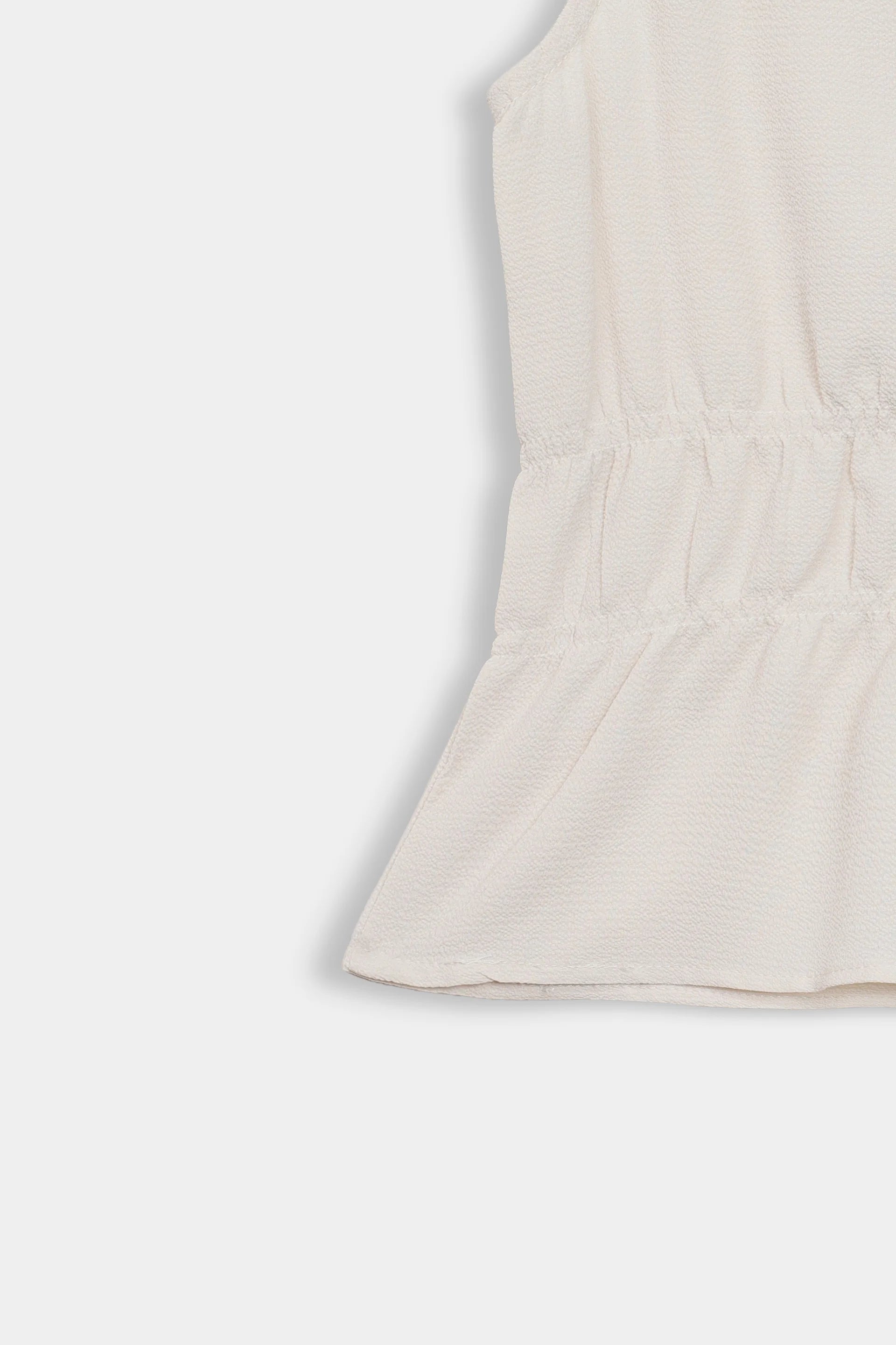 Sleeveless Peplum Top - Cougar Clothing
