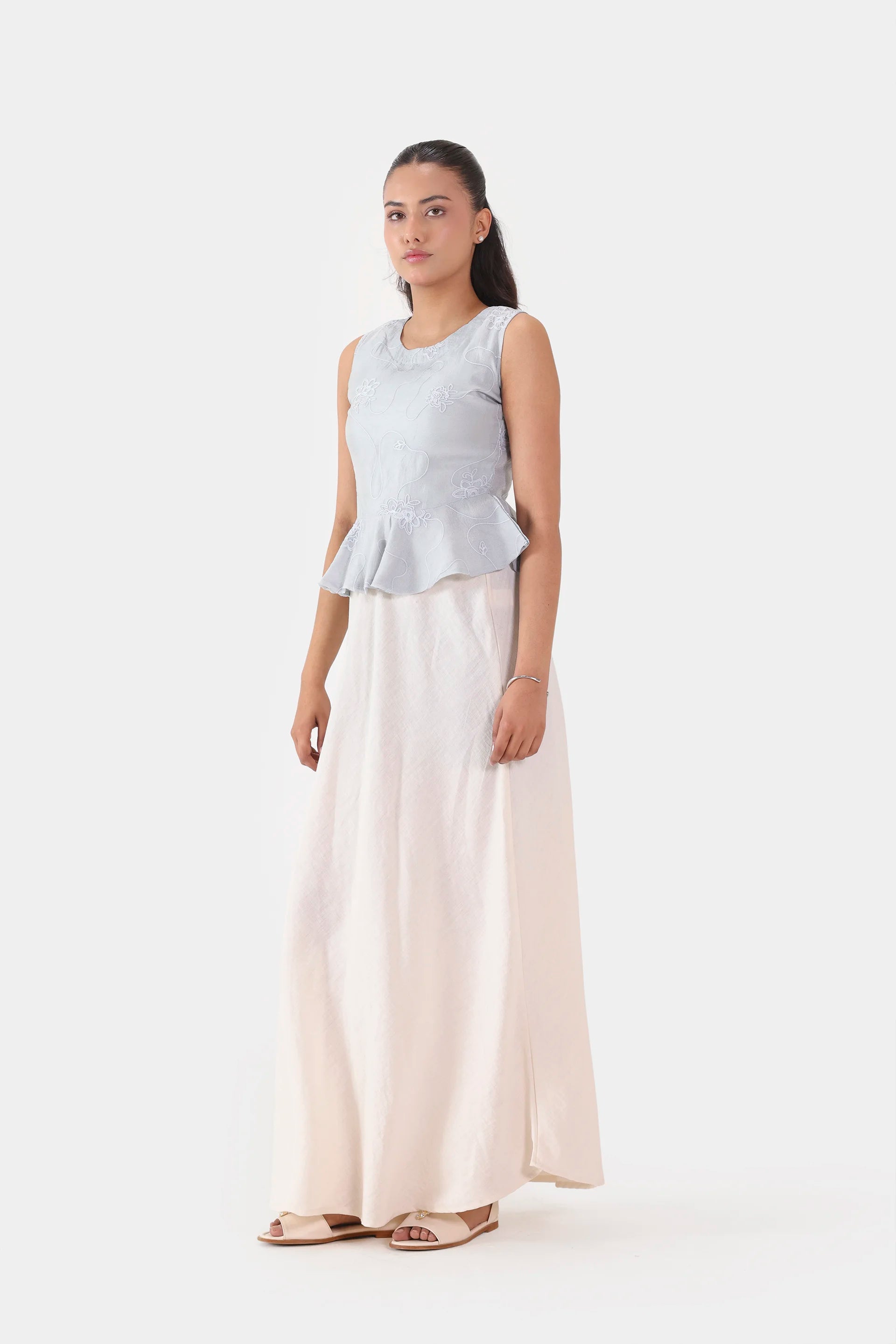 Embroidered Sleeveless Peplum - Cougar Clothing