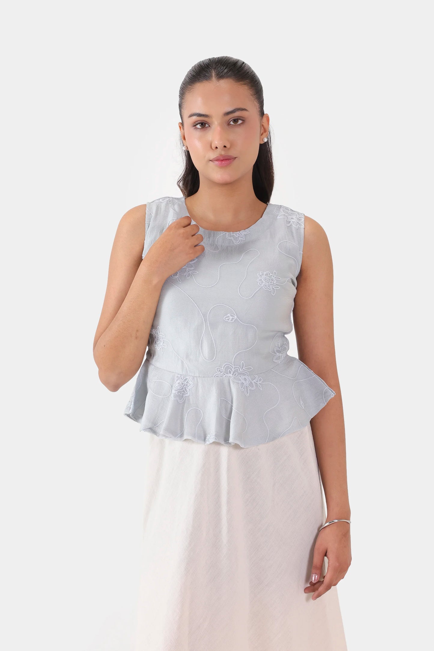 Embroidered Sleeveless Peplum - Cougar Clothing