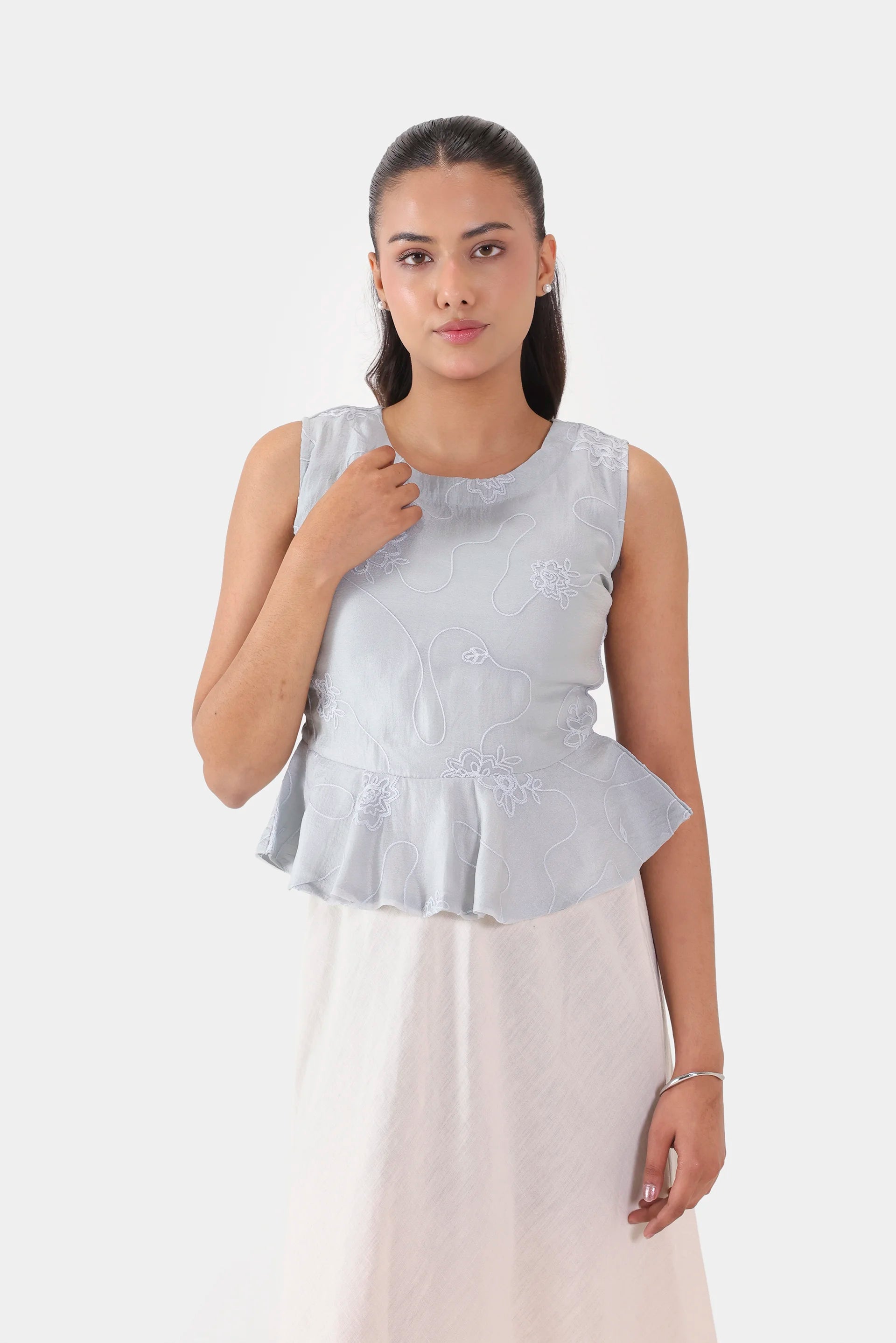 Embroidered Sleeveless Peplum - Cougar Clothing