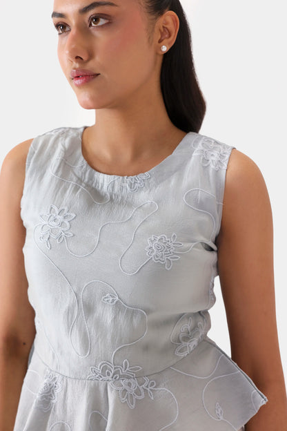 Embroidered Sleeveless Peplum - Cougar Clothing