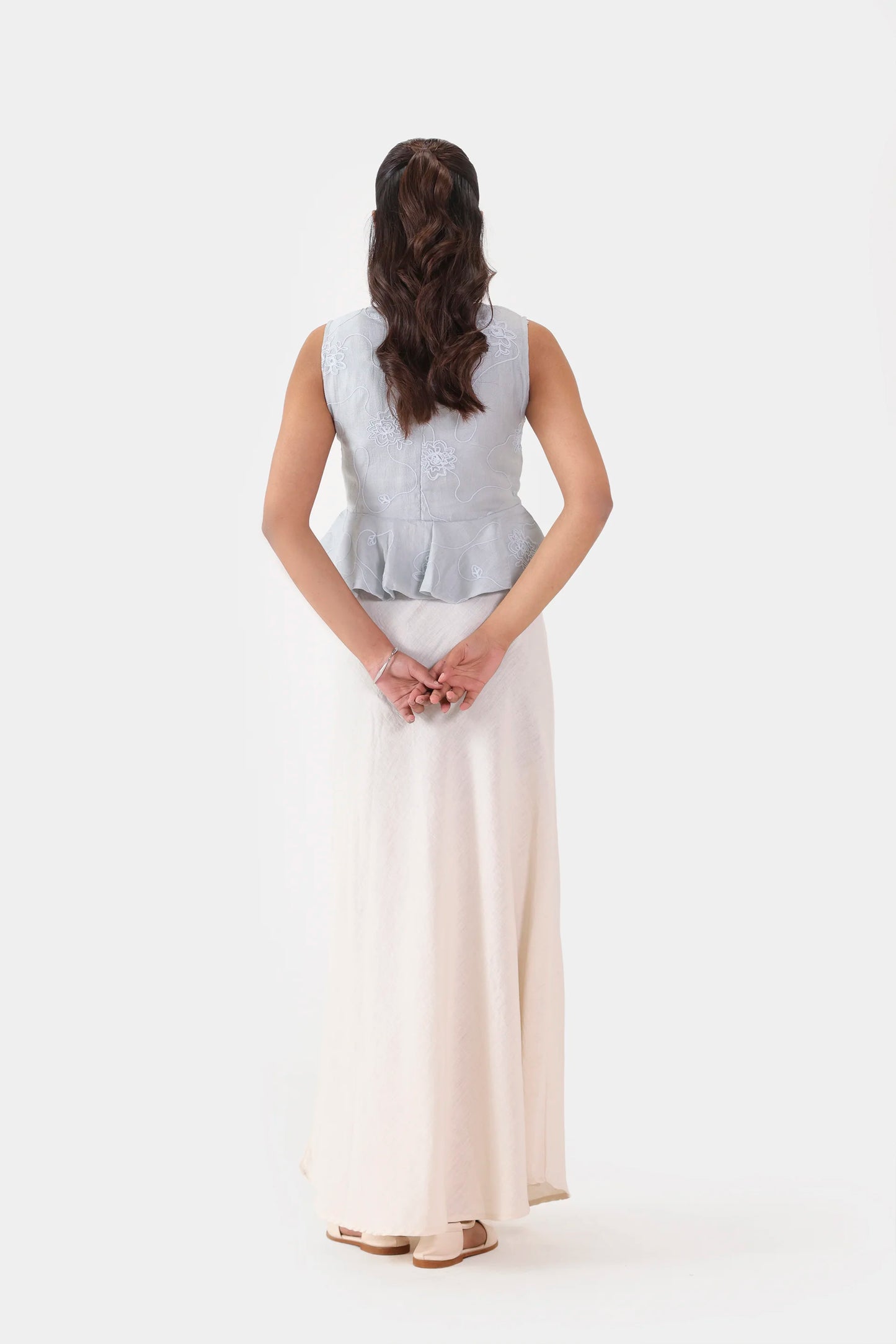 Embroidered Sleeveless Peplum - Cougar Clothing