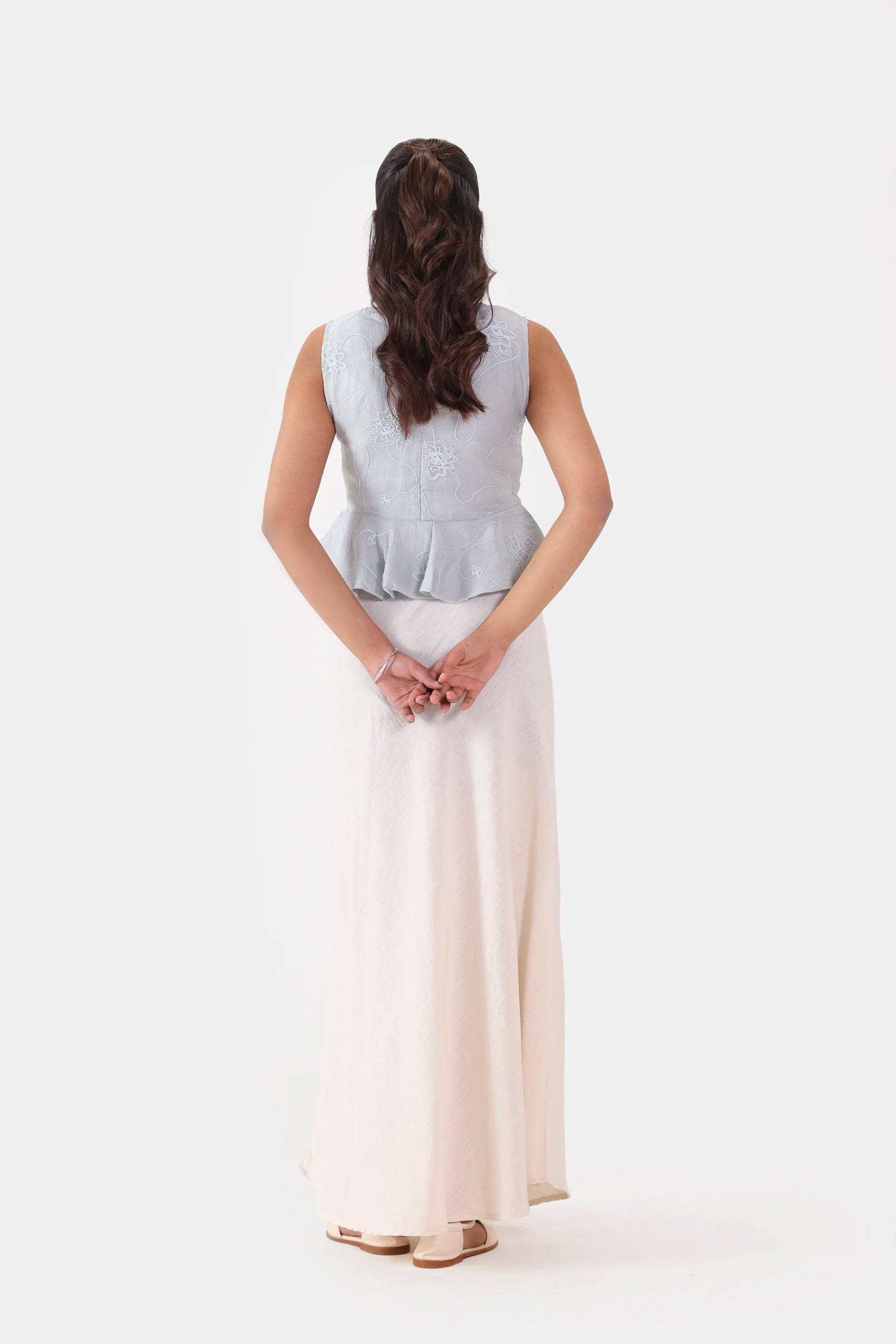 Embroidered Sleeveless Peplum - Cougar Clothing