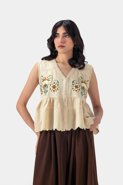 Embroidered Peplum Top - Cougar Clothing