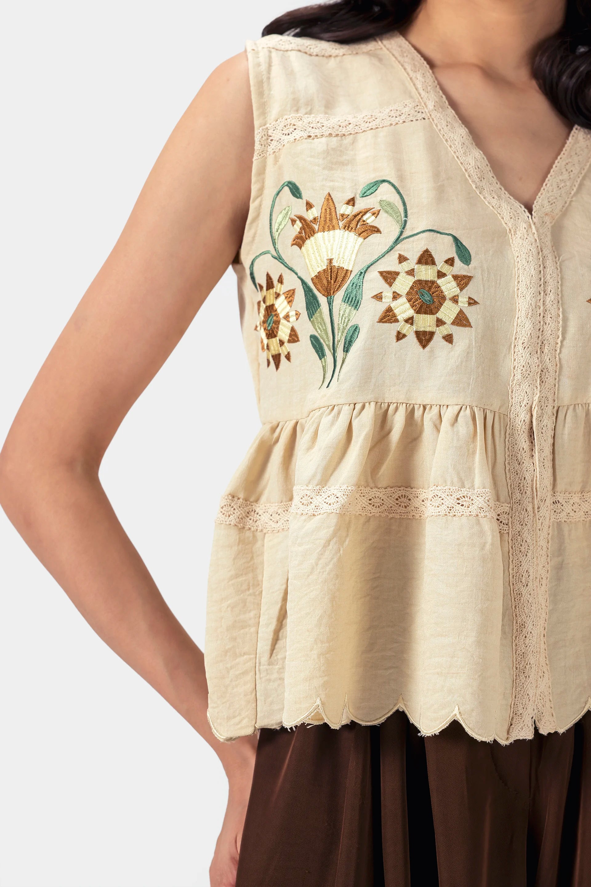 Embroidered Peplum Top - Cougar Clothing
