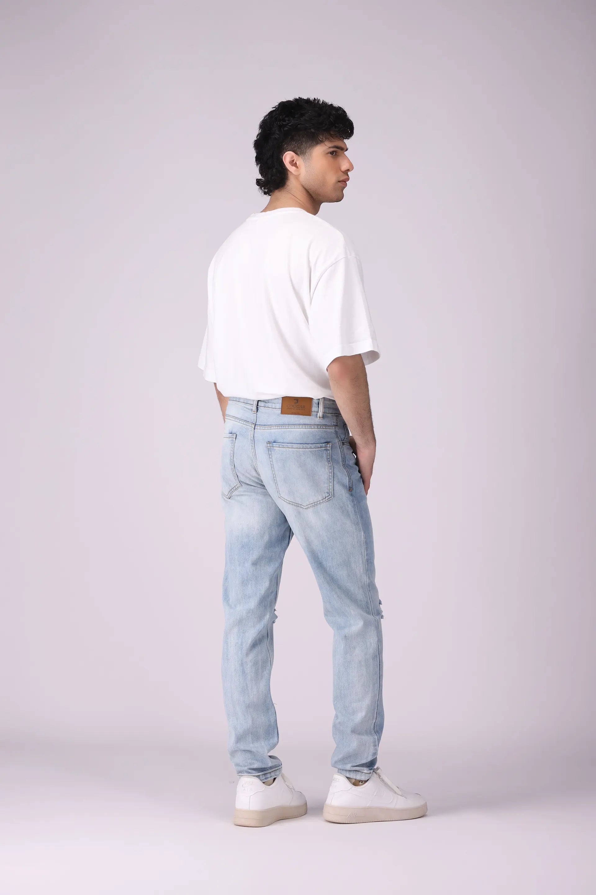 Tapered Fit Ripped Jeans - Cougar Clothing