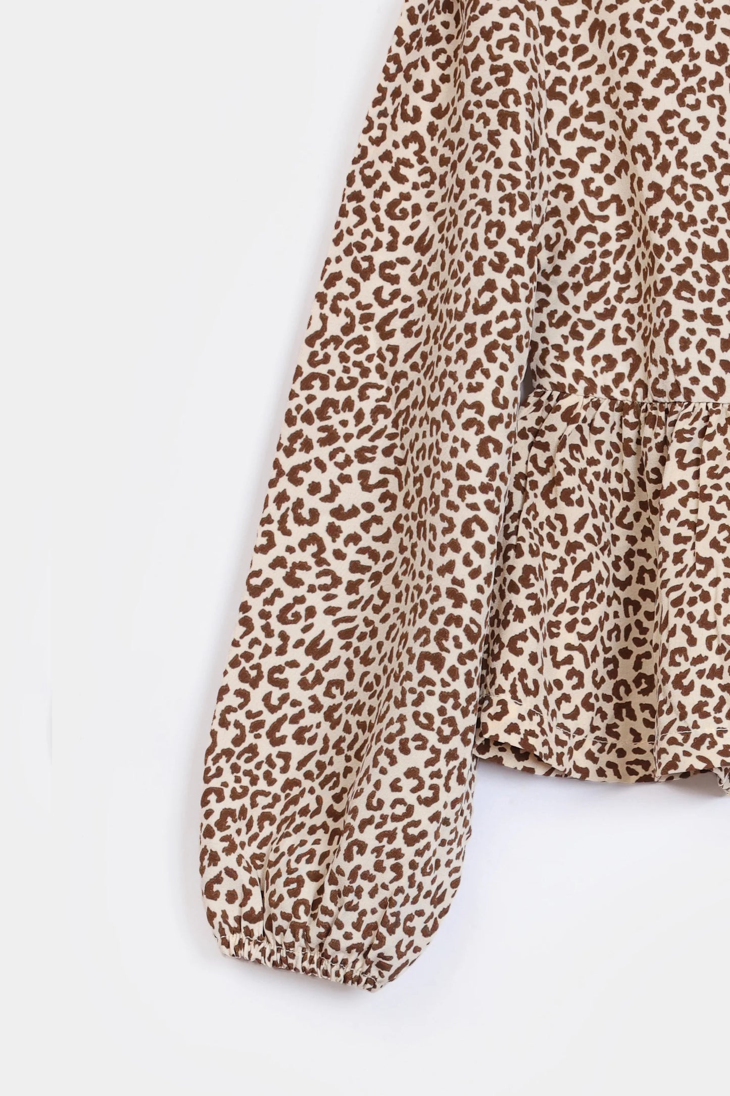 Cheetah Print Peplum - Cougar Clothing